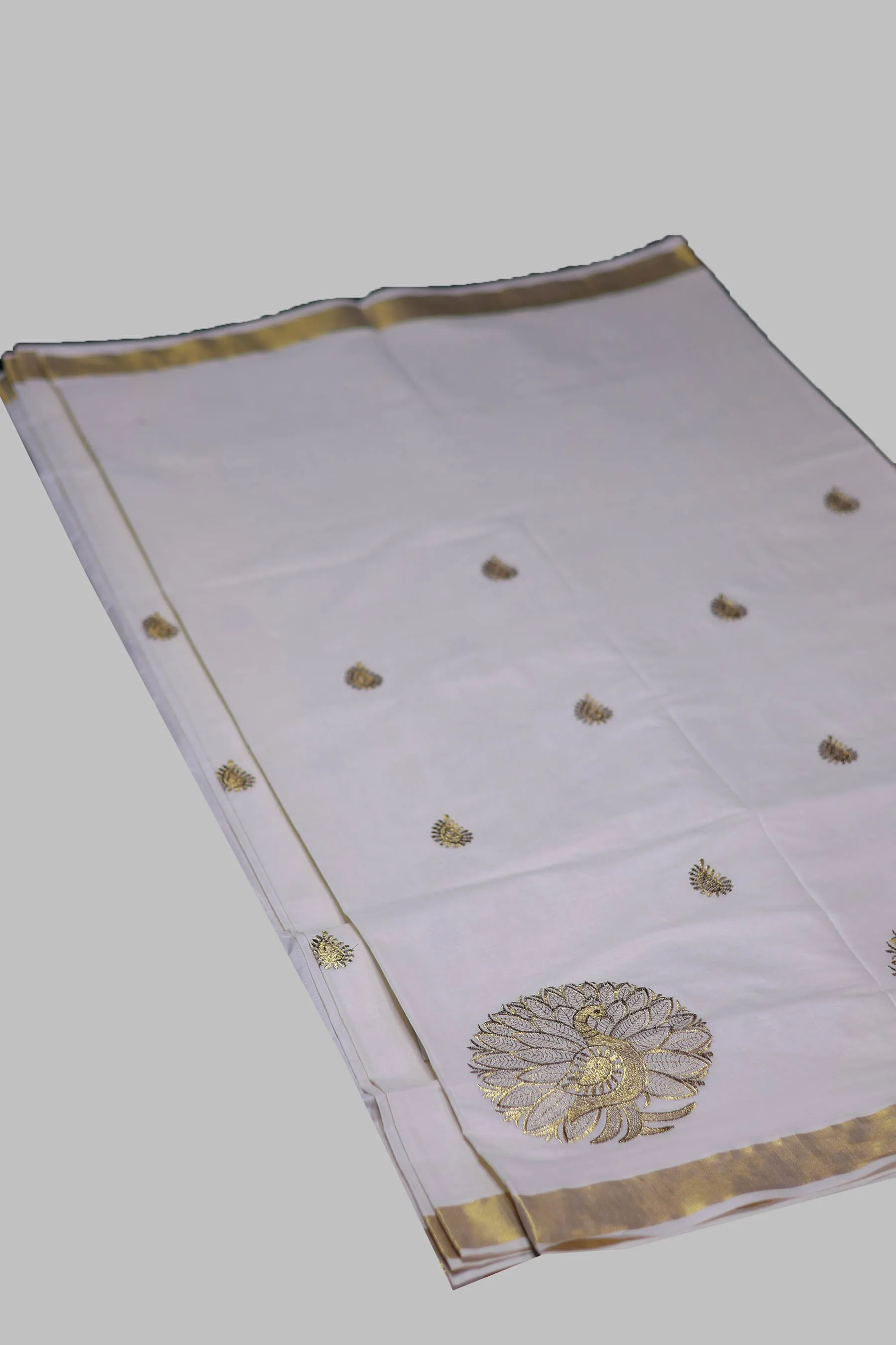 Elegant Kerala Cotton Saree with Peacock Motifs & Gold Zari Border