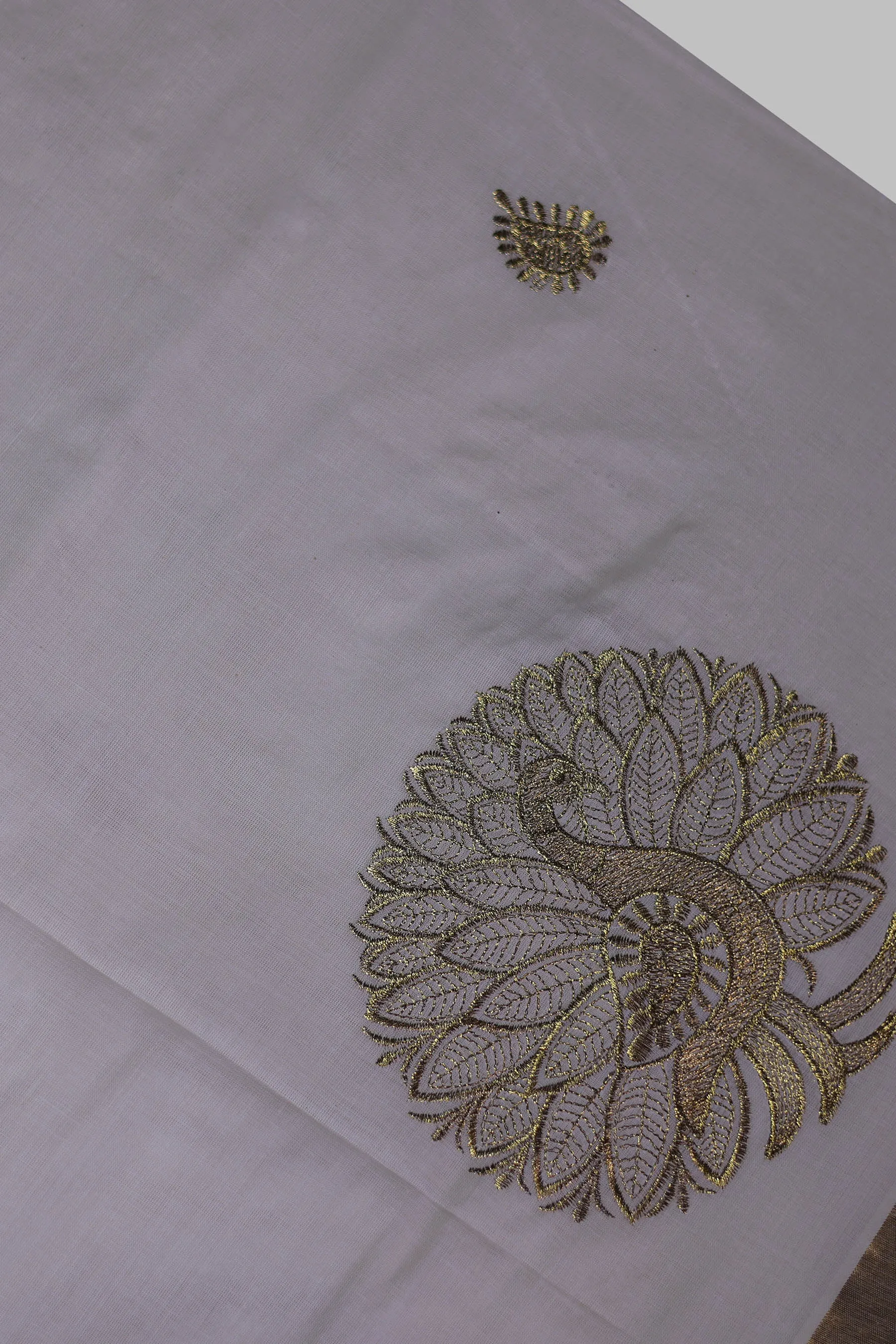 Elegant Kerala Cotton Saree with Peacock Motifs & Gold Zari Border