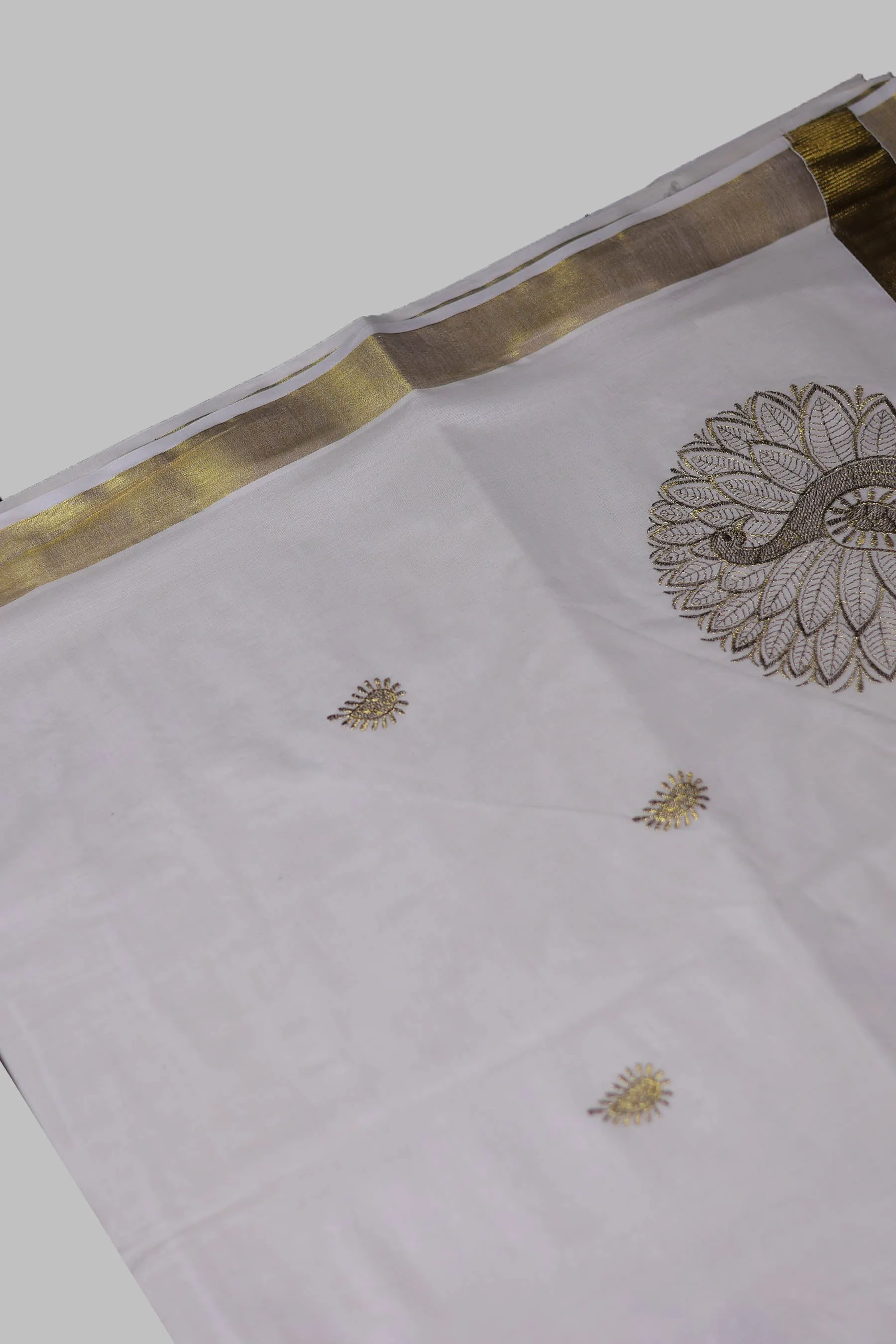 Elegant Kerala Cotton Saree with Peacock Motifs & Gold Zari Border