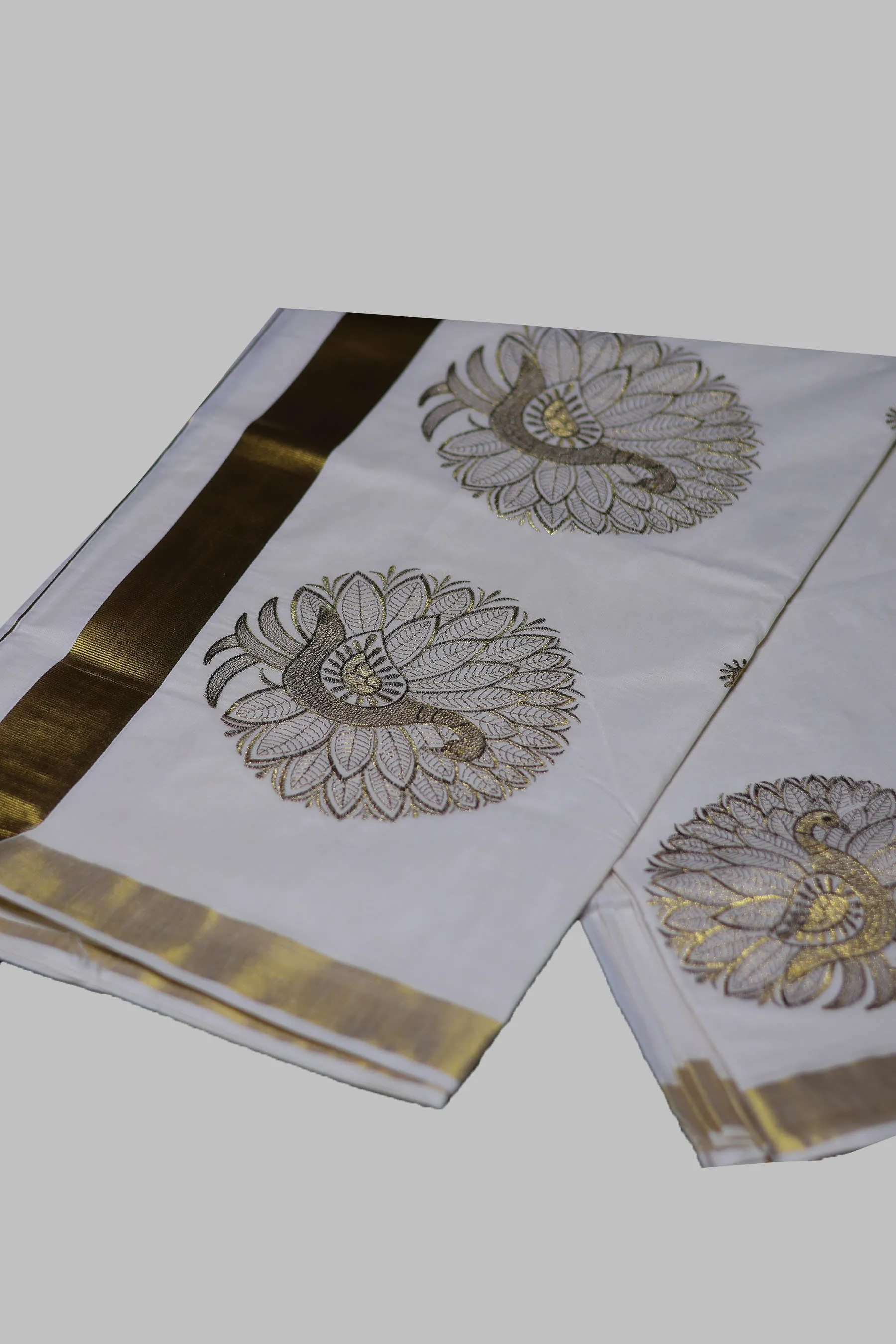 Elegant Kerala Cotton Saree with Peacock Motifs & Gold Zari Border
